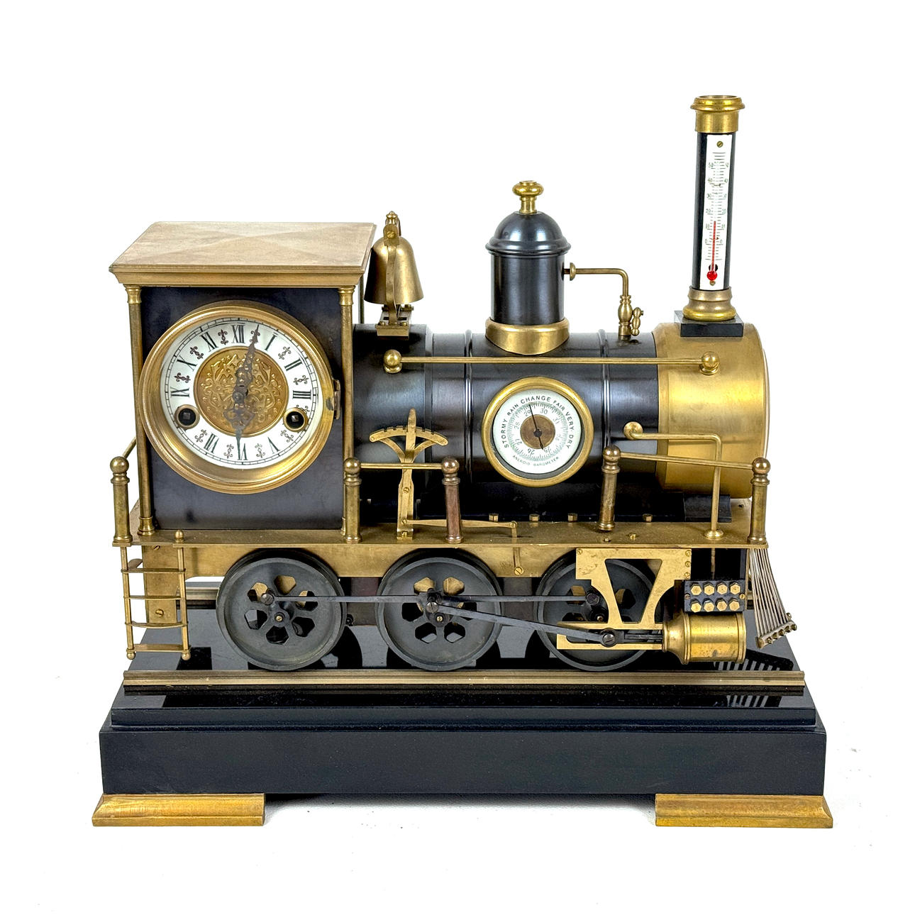 LOKOMOTIV UR I MESSING OG STÅL.