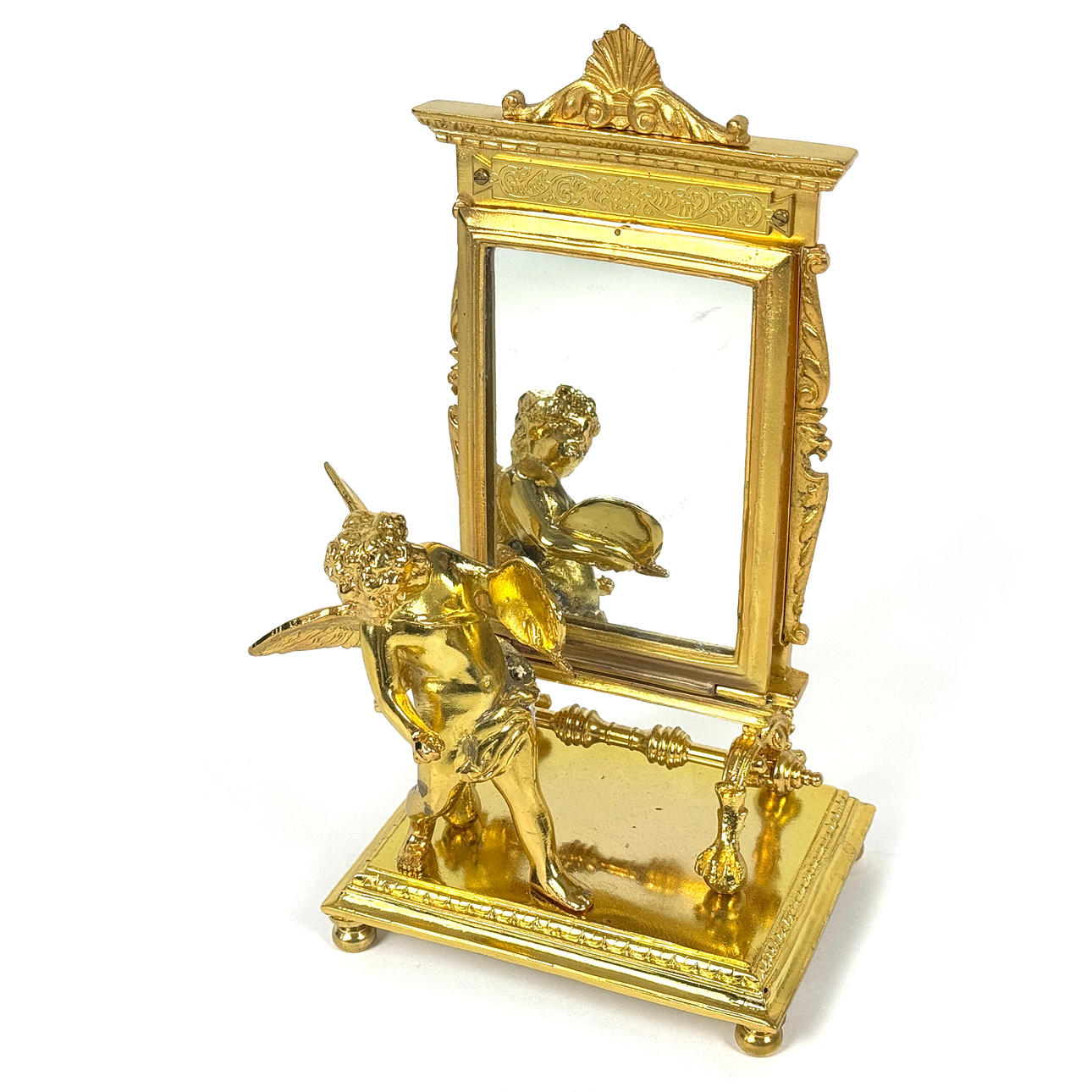 GILT METAL CHERUB DRESSING TABLE MIRROR.