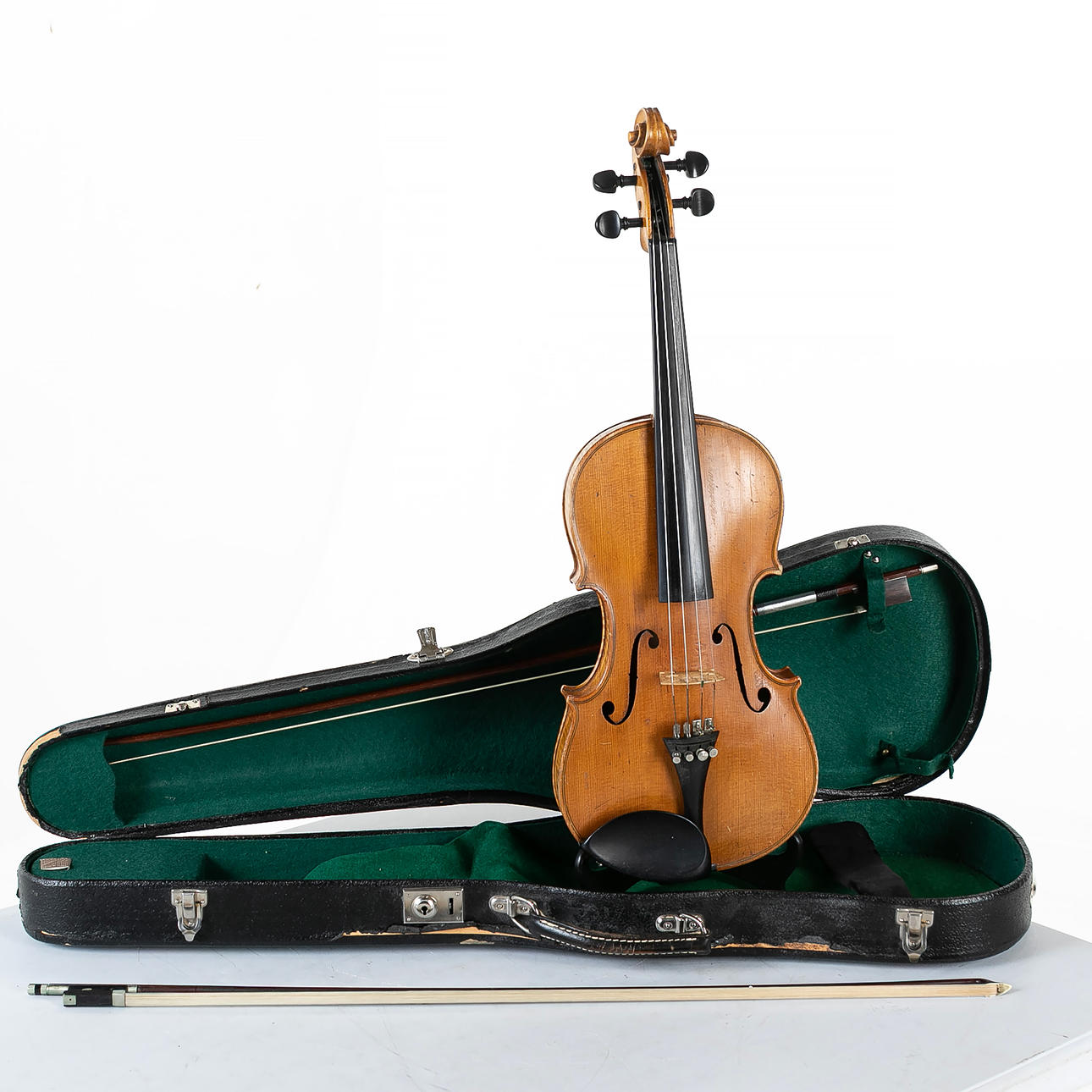 Violin, with 2 strings & case, marked Joseph Guarnerius 1742.