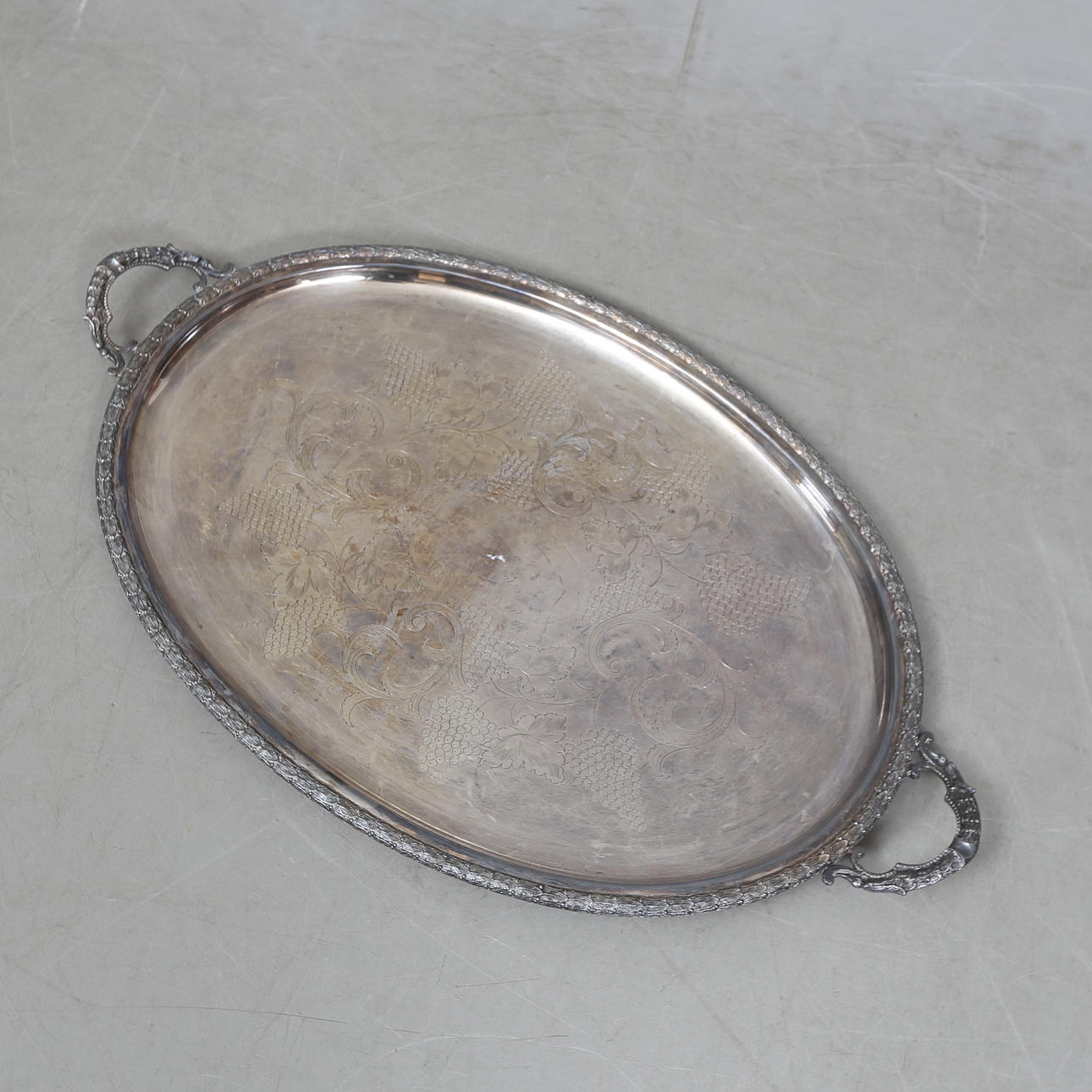 A serving tray, nickel silver, circa 1900.