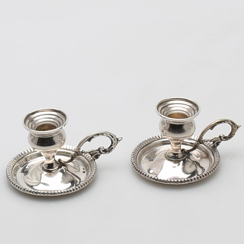 LJUSHÅLLARE i silver, ett par, 1900-tal.