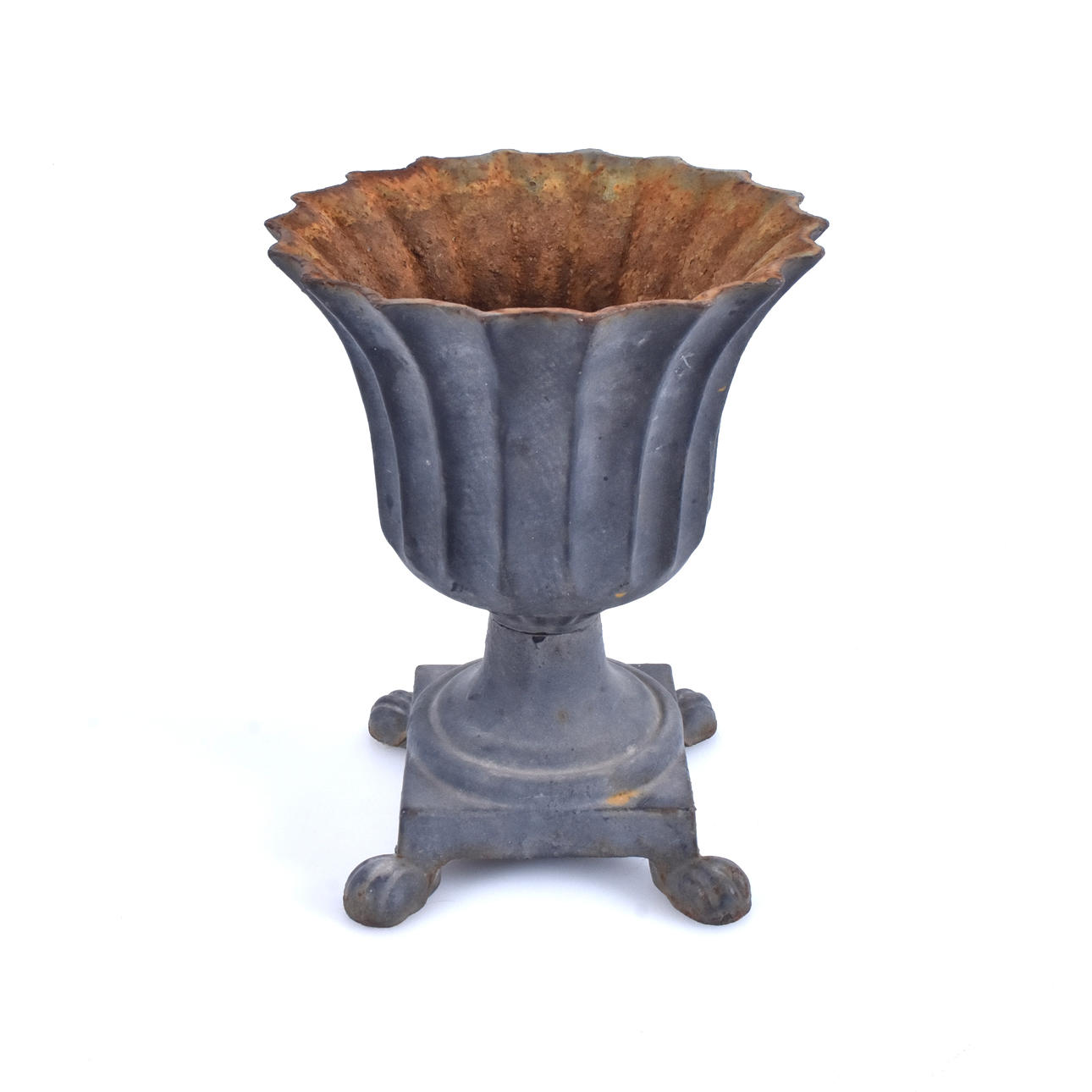 A 20th-century cast iron urn.