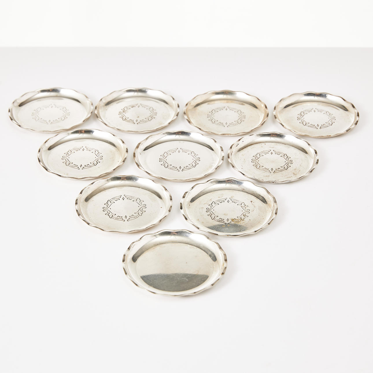 COASTERS, 10 pcs, silver, wavy brim, 9 pcs with leaf decor.