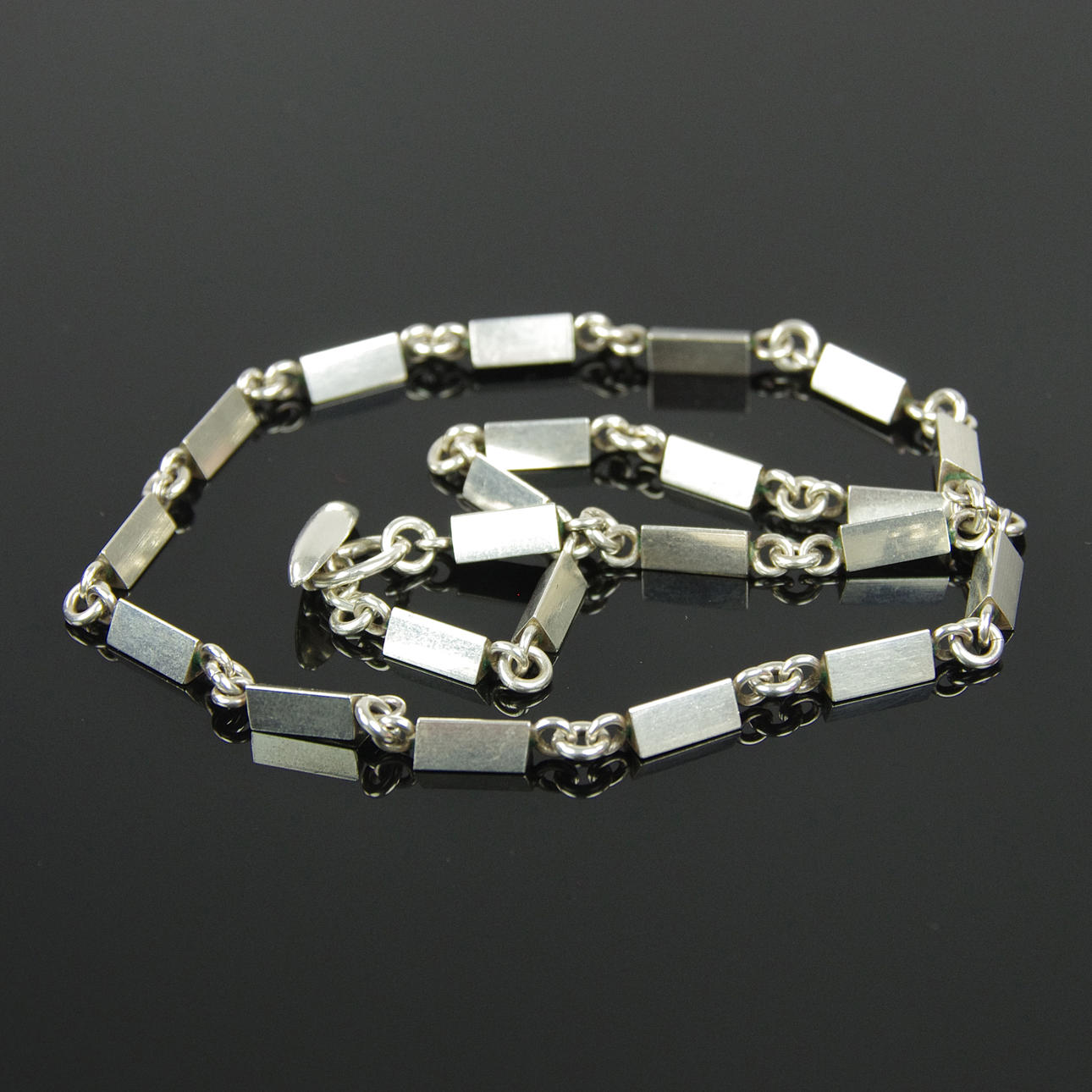 HALSBAND, silver, triangulära stavar.