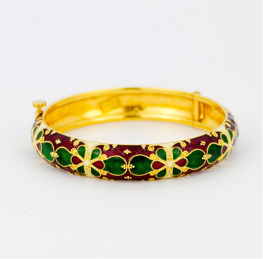 22KT GULT GULD OCH EMALJERAD ARMRING.