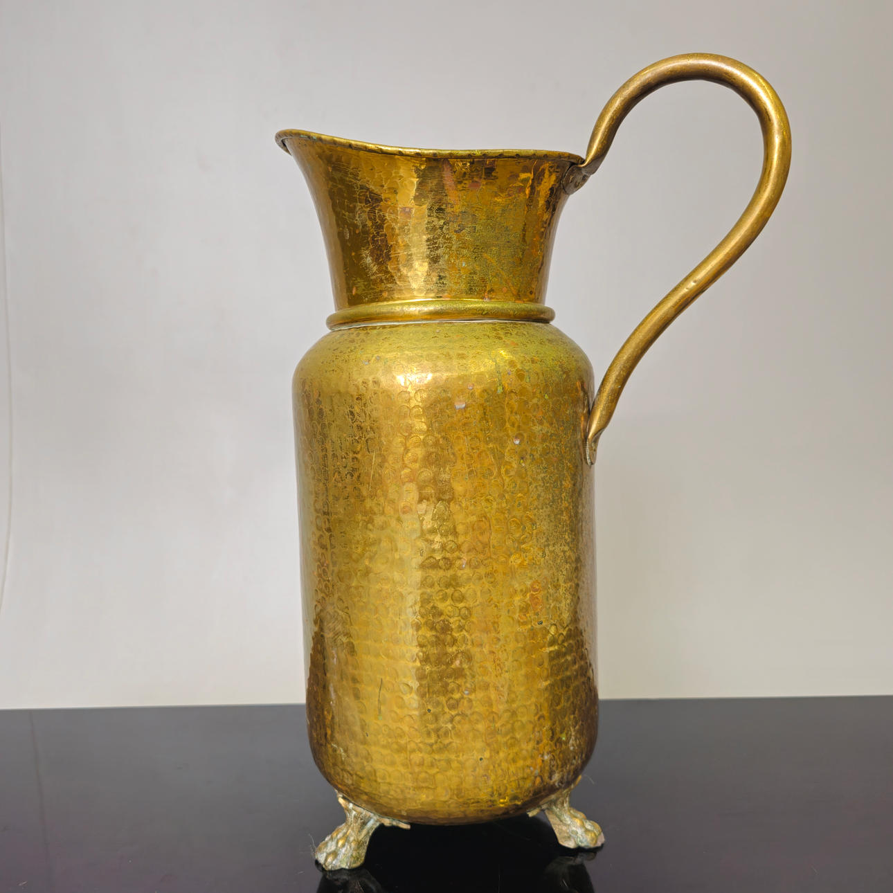 AGUAMANIL UMBRELLA STAND IN BRASS.