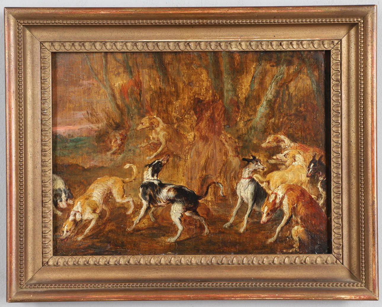 FOLLOWER OF PAUL DE VOS (C.1591-1678). A PACK OF HOUNDS BY A WOOD.
