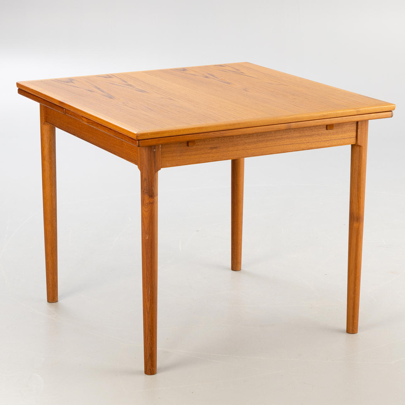 Square teak dining table, extendable 1960s.