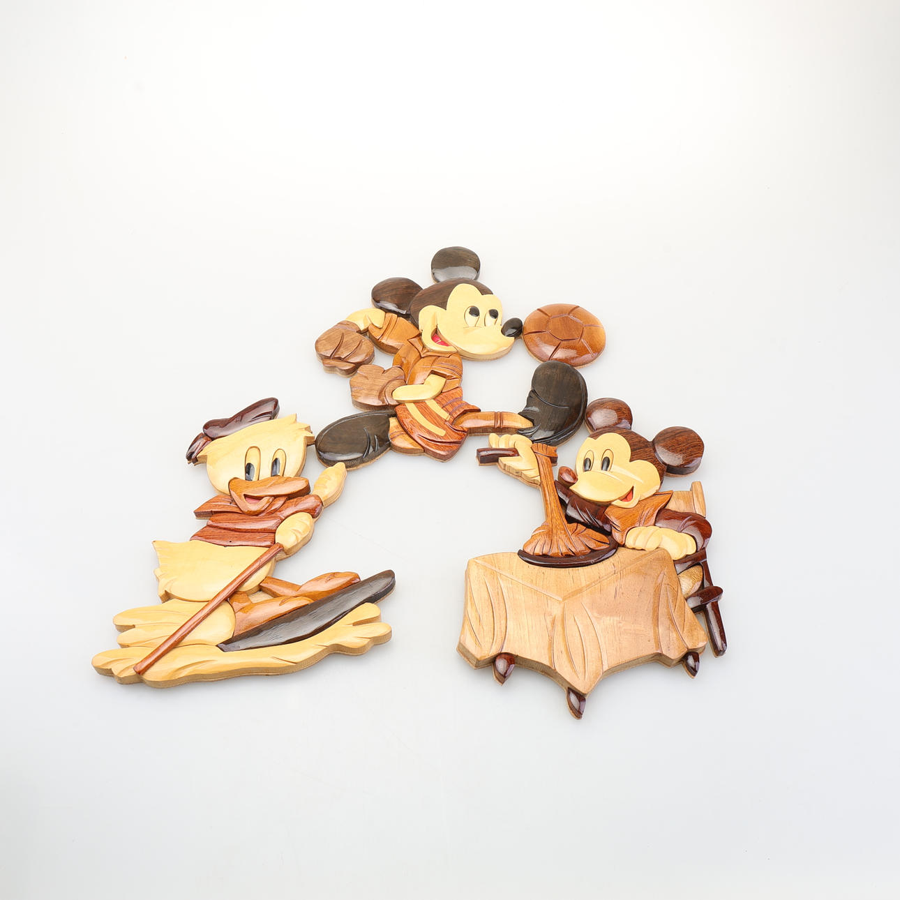 A WOODEN WALL SCULPTURE, Mickey Mouse, 3 pcs.