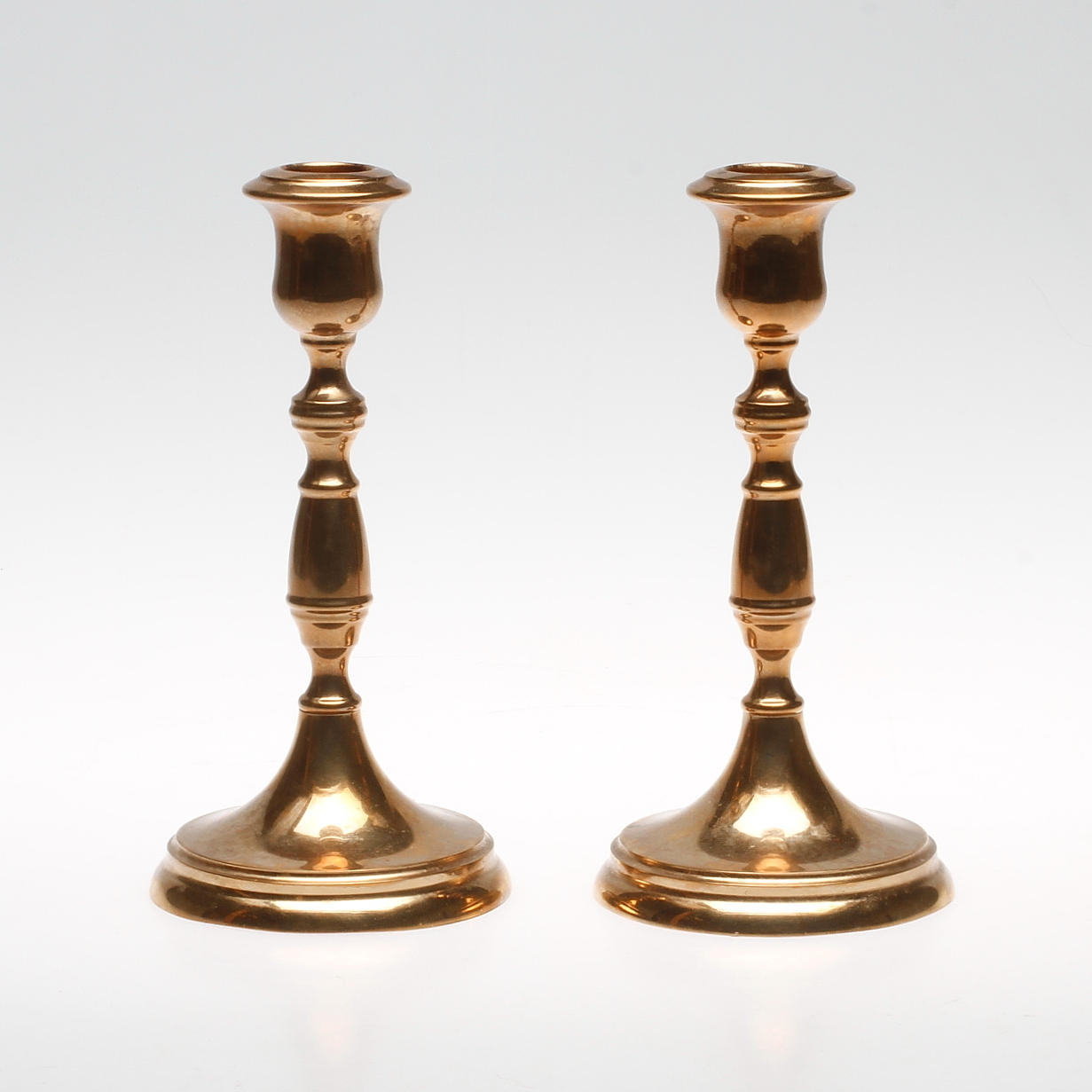 LJUSSTAKAR, ett par, mässing, Bersbo. 1995.