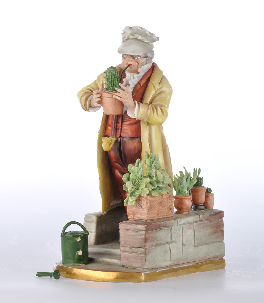 MANU SITZENDORF. "Der Kaktusfreund" Bisquitporslin, polykrom färg.