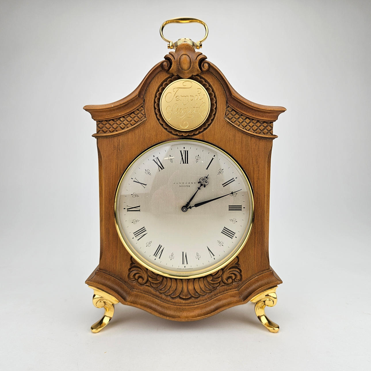 JUNGHANS. A “Tempus fugit” table clock, Meister, Germany.