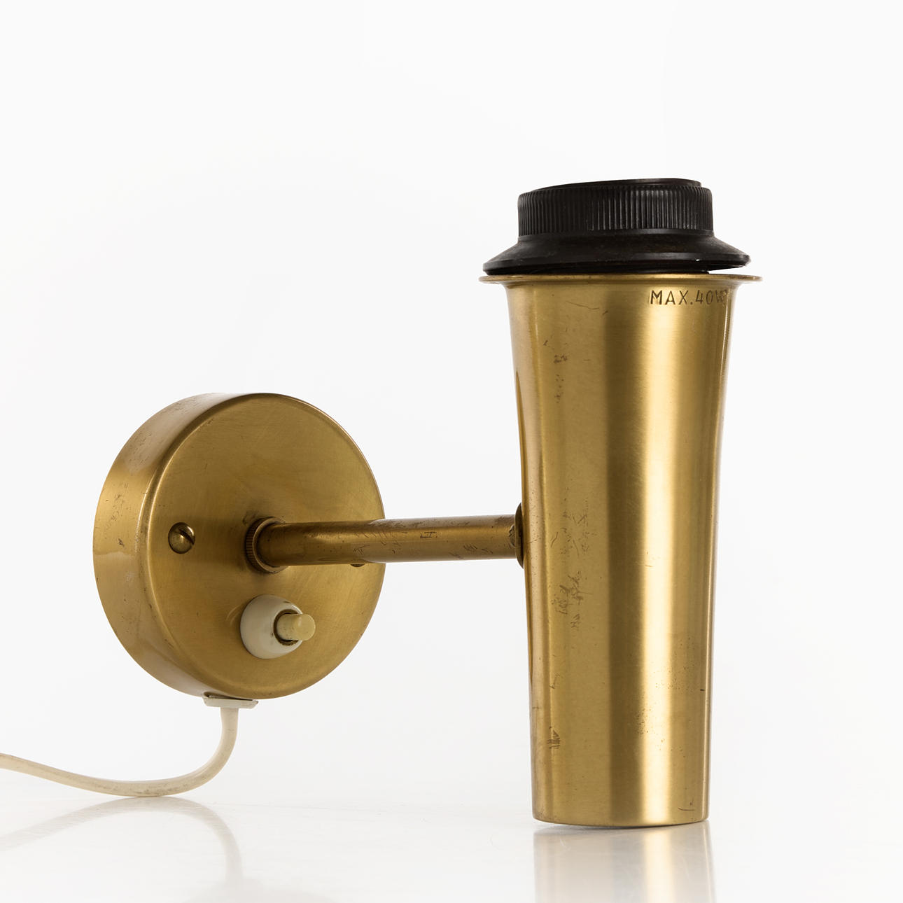 A brass wall lamp, model 415, Philips, 1950/60s.