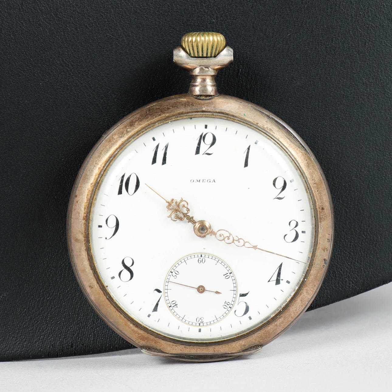 OMEGA taskukello, hopeakotelo, 1900-luvun alkupuoli.