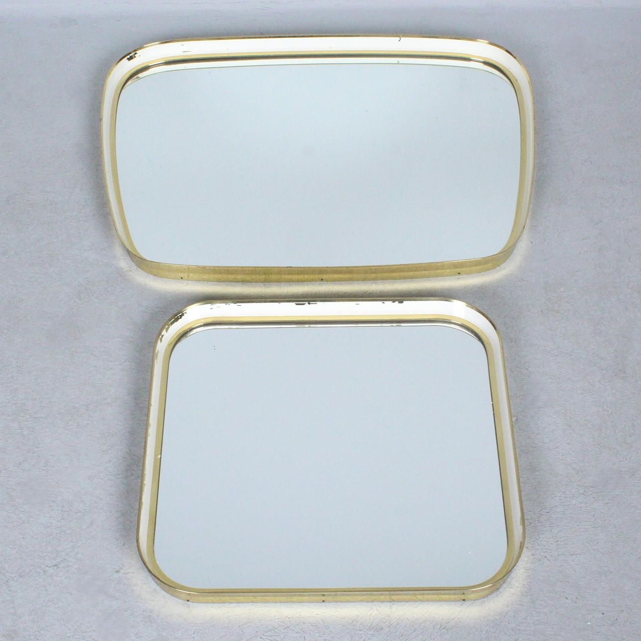 Munich decorative mirror. Two mirrors/wall mirrors, brass, Germany, 1950s.