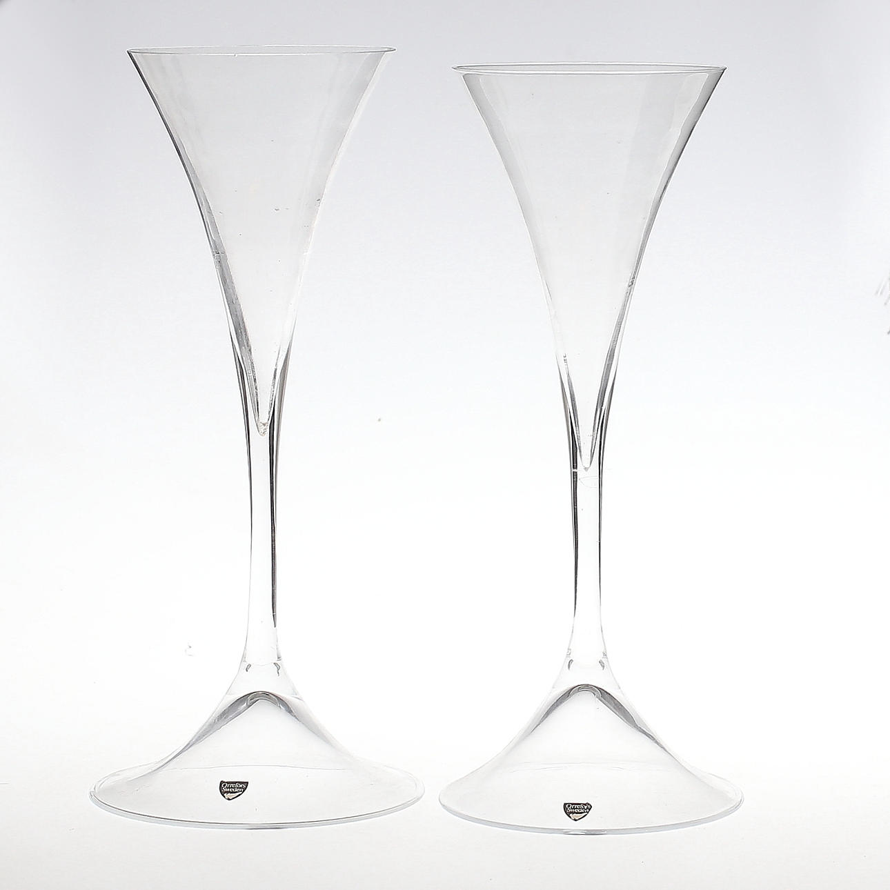 LJUSSTAKAR, ett par, glas, Orrefors, sent 1900-tal/samtida.