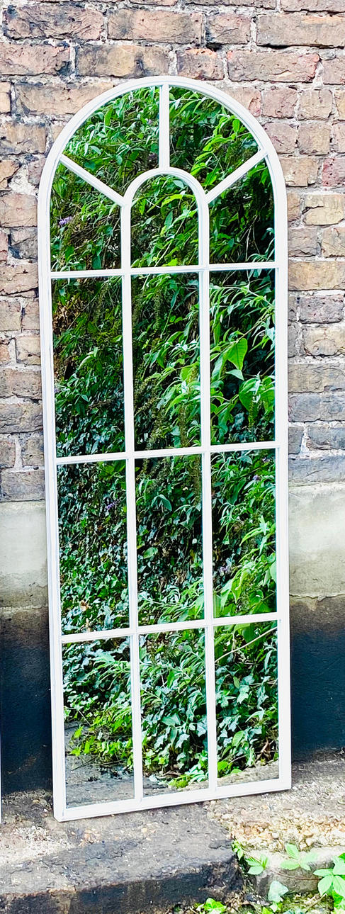 A REGENCY STYLE GARDEN MIRROR.