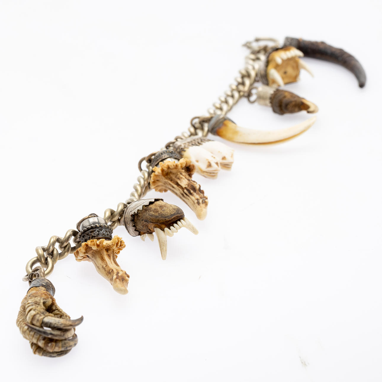 Charivari with nine pendants, silver, Germany, around 1900.