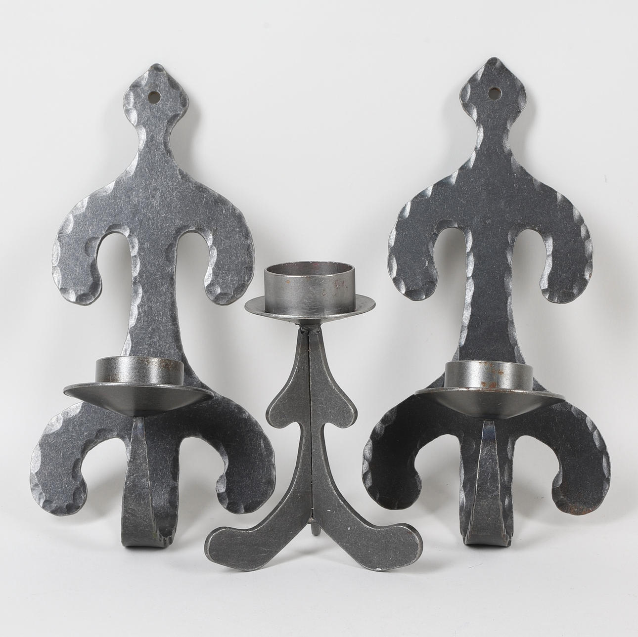 WALL-CANDLESTICKS & TABLE CANDLESTICKS, 3 pieces, wrought, second half of the 20th century.
