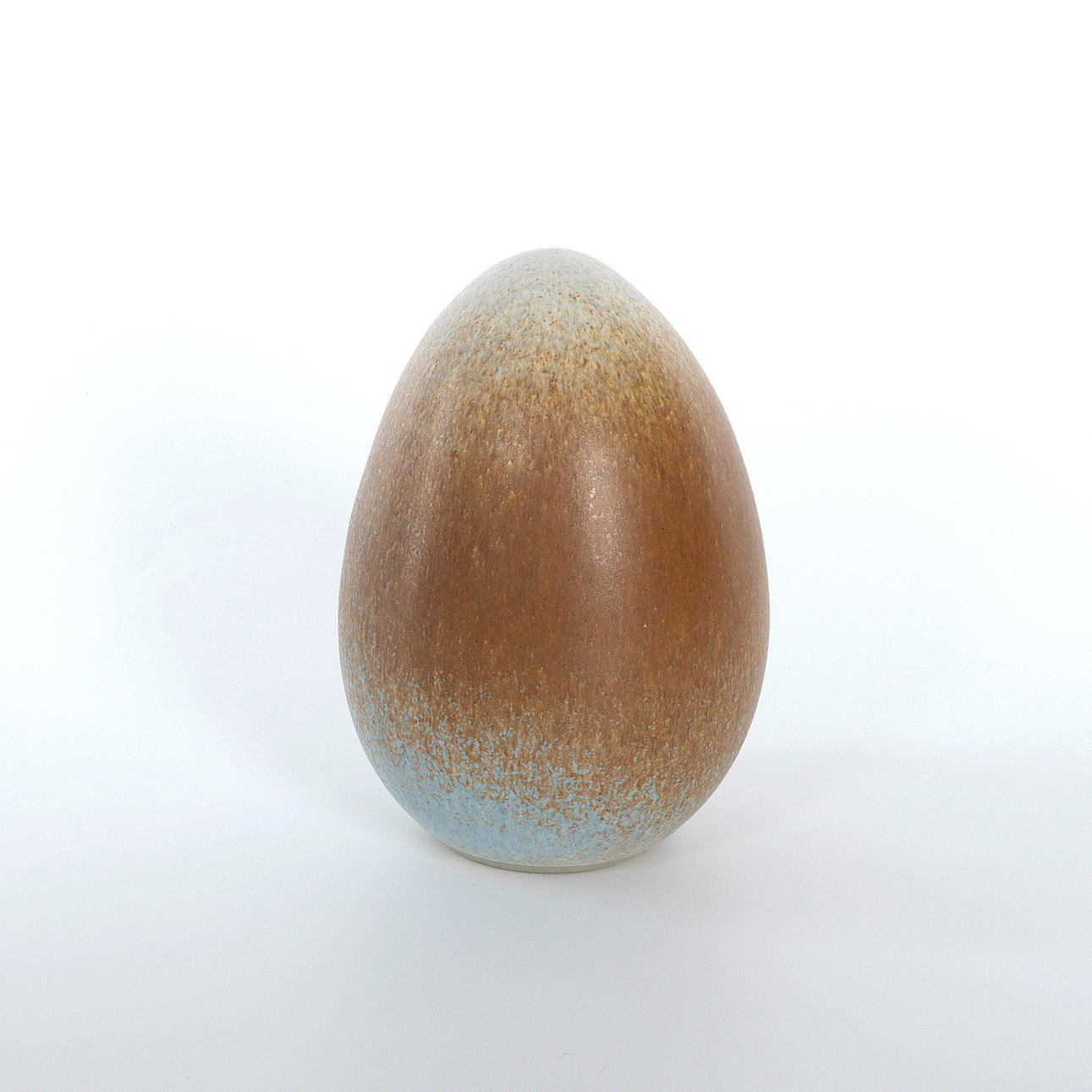 SCULPTURE, egg, glazed stoneware.