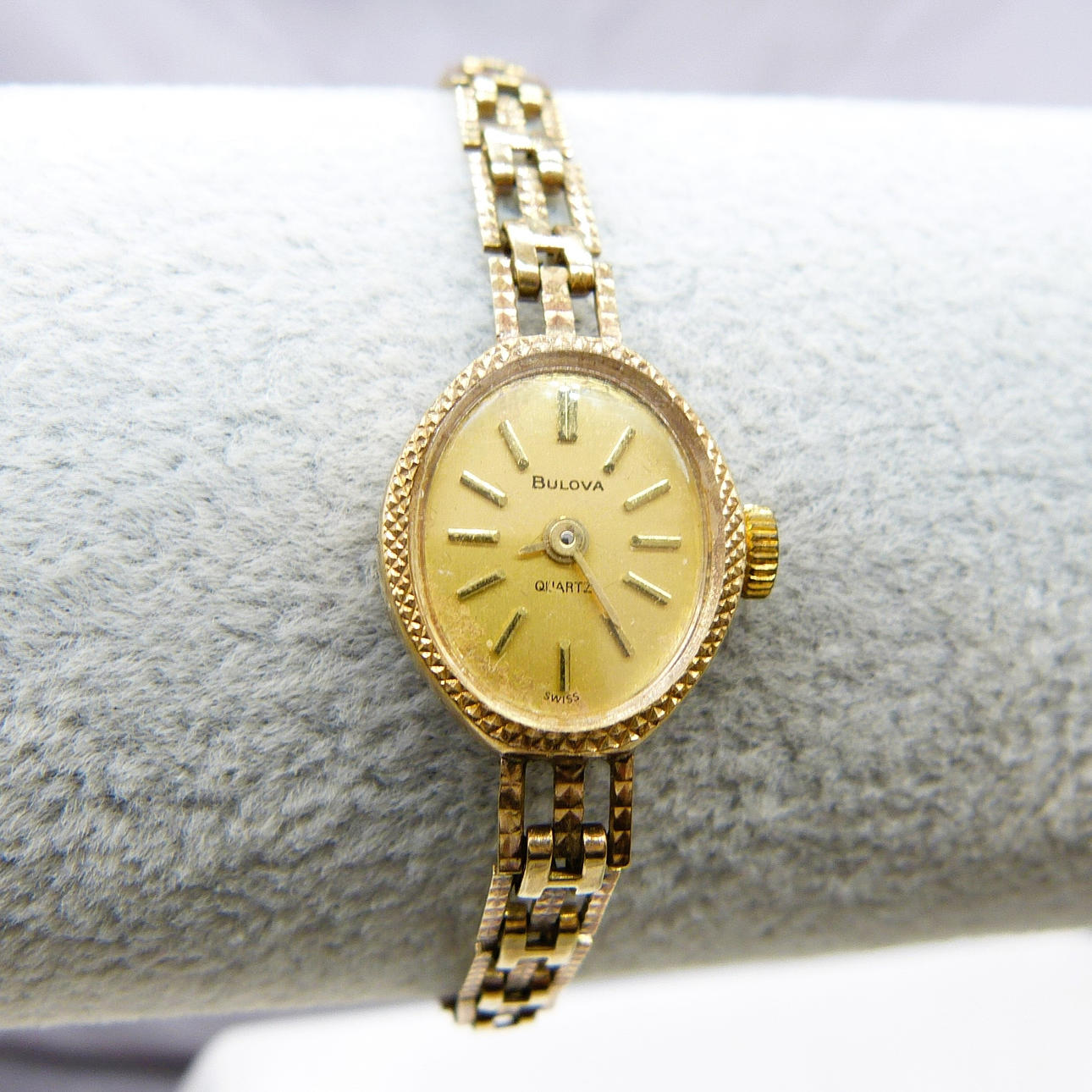 9CT GOLD BULOVA LADIES WATCH.