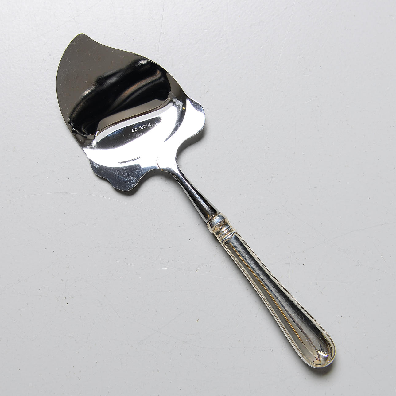 Cheese grater, silver, Estonia.