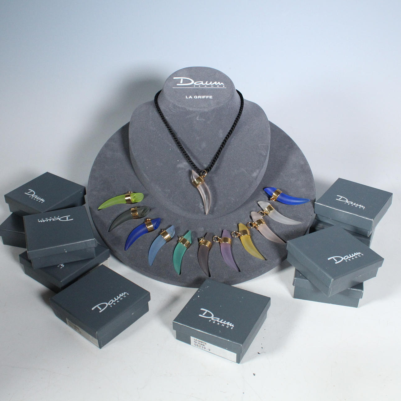 PHILIPPE STARCK. 12 pendants, model 'La Griffe' signed, France.