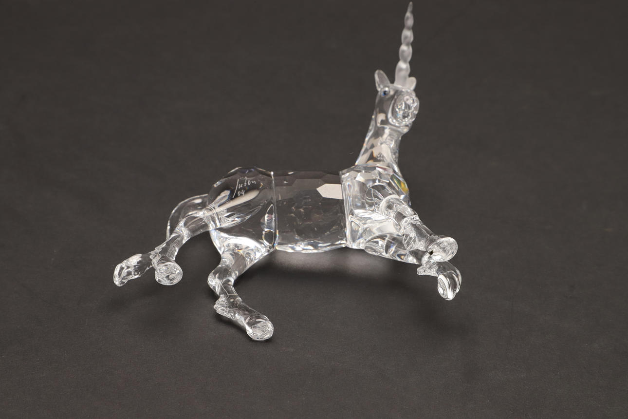 A SWAROVSKI CRYSTAL FIGURE OF A UNICORN. Glass - Other - Auctionet