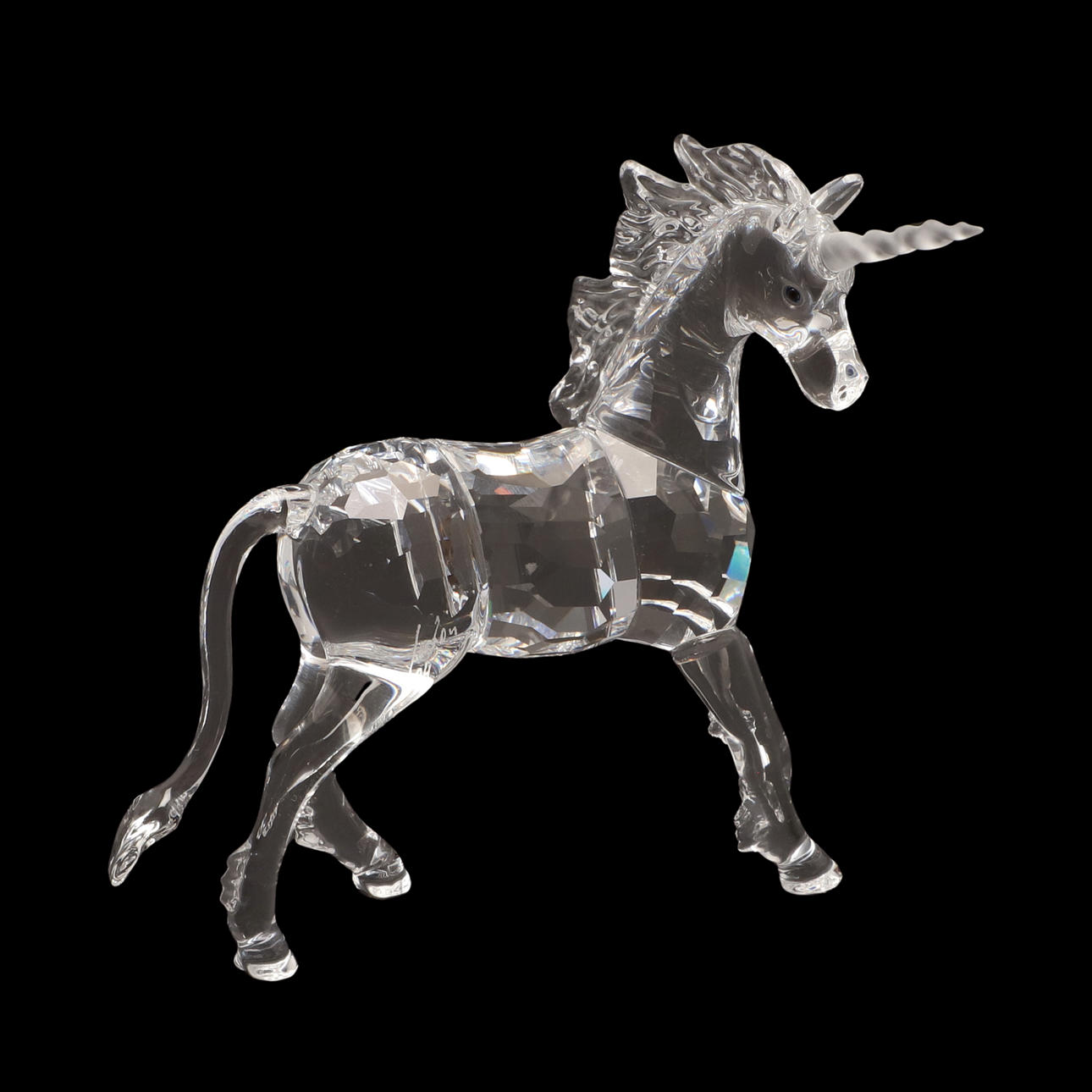 A SWAROVSKI CRYSTAL FIGURE OF A UNICORN. Glass - Other - Auctionet