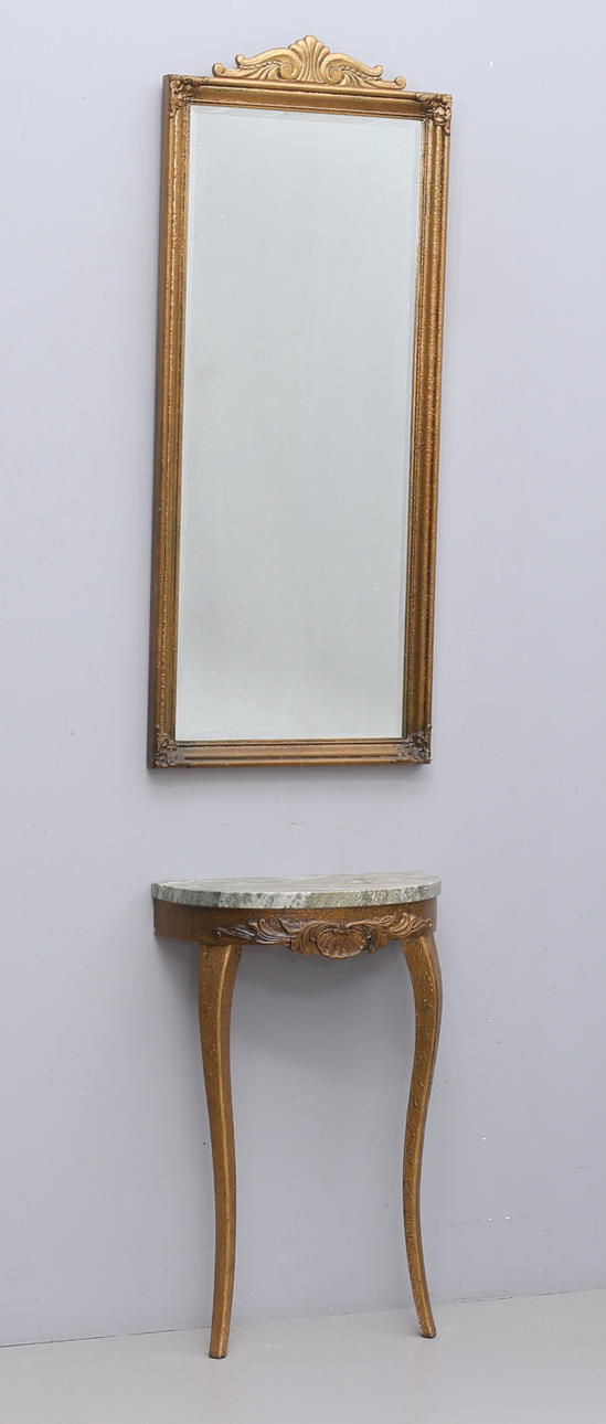 A mirror with a wooden table, 20th century.
