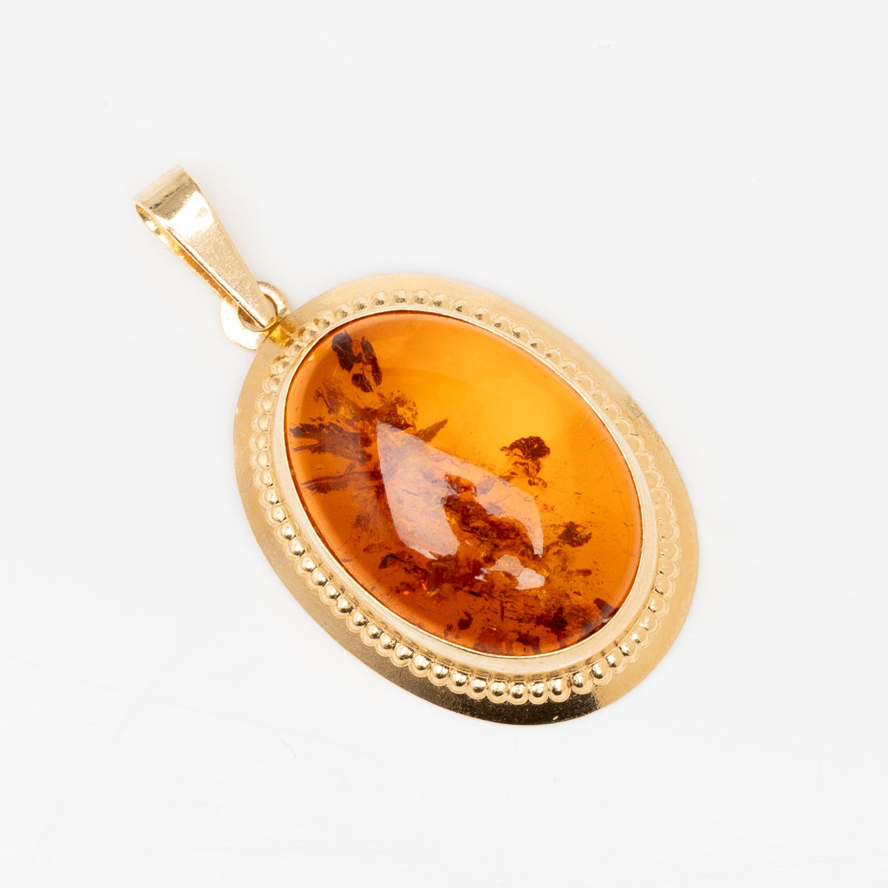 HÄNGE, 18K guld, orange sten, 1900-tal.