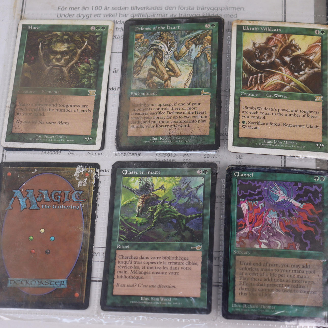 MAGIC THE GATHERING, cover with assorted collectible cards.
