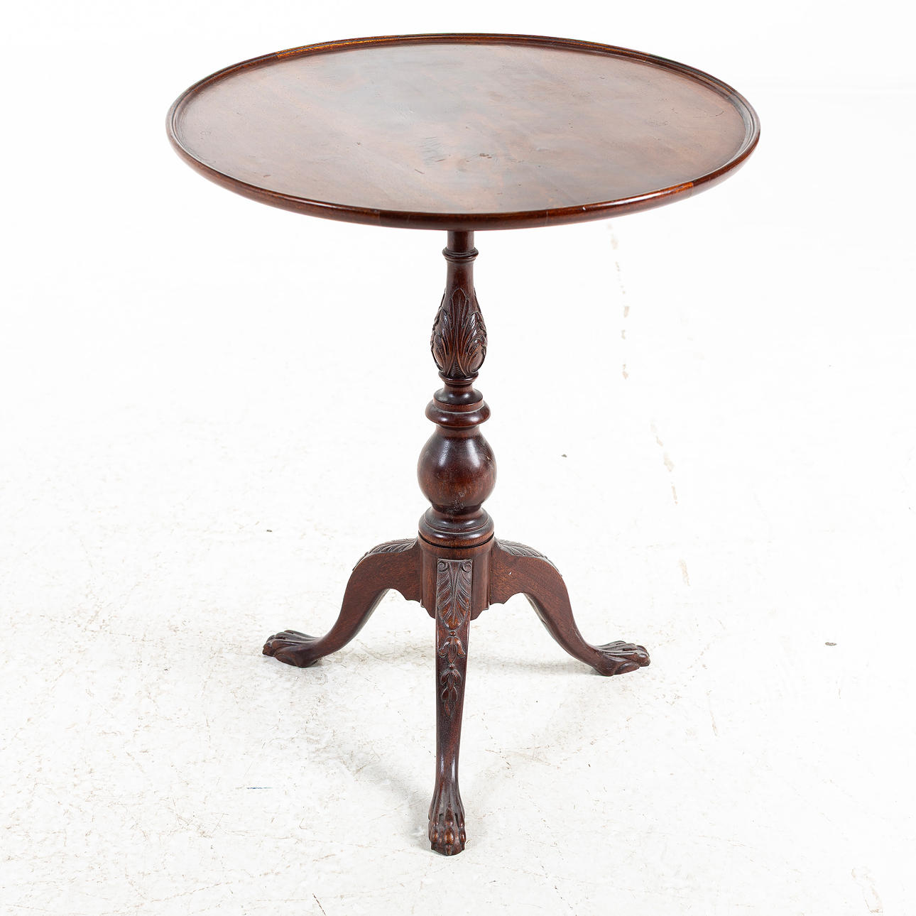 A 20th century birch pillar table.