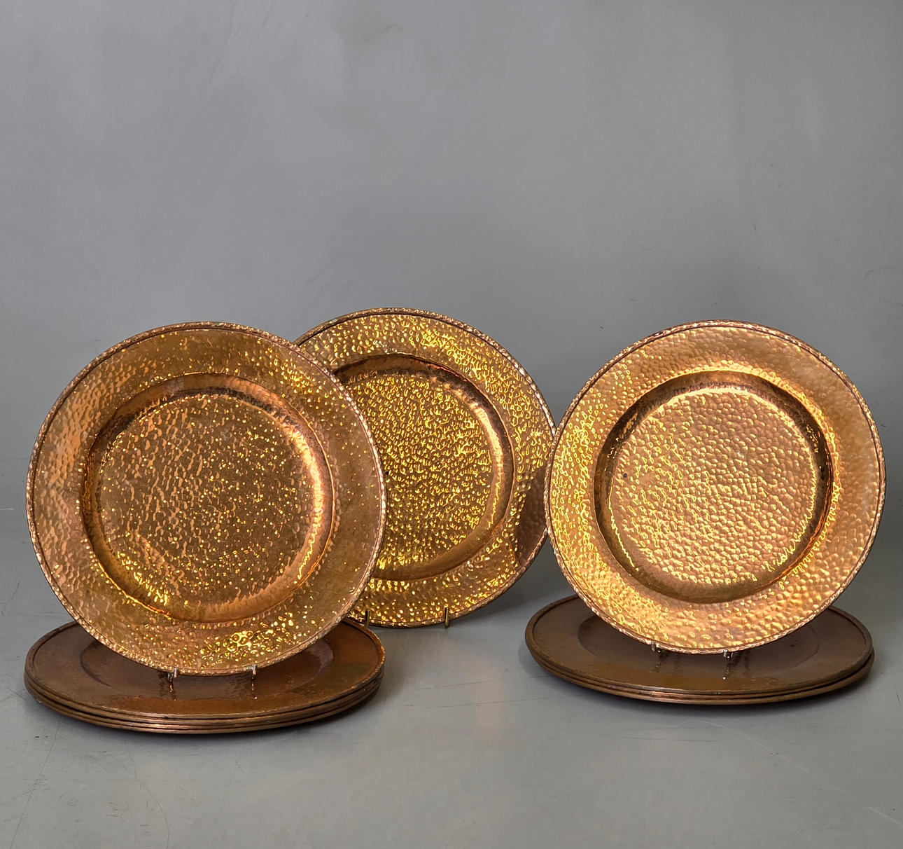 9 BAJO PLATOS EN COBRE.