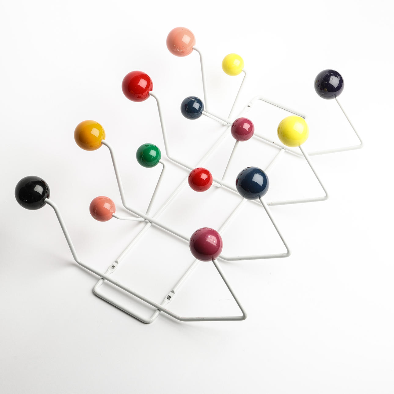 RAY & CHARLES EAMES. Clothes rack, “Hang it all”.