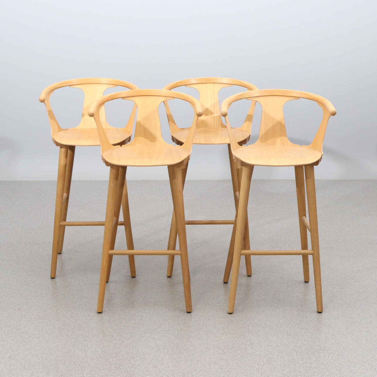 SAMI KALLIO, FOUR BARSTOOLS “IN BETWEEN BARSTOOL”. Light oak veneer.