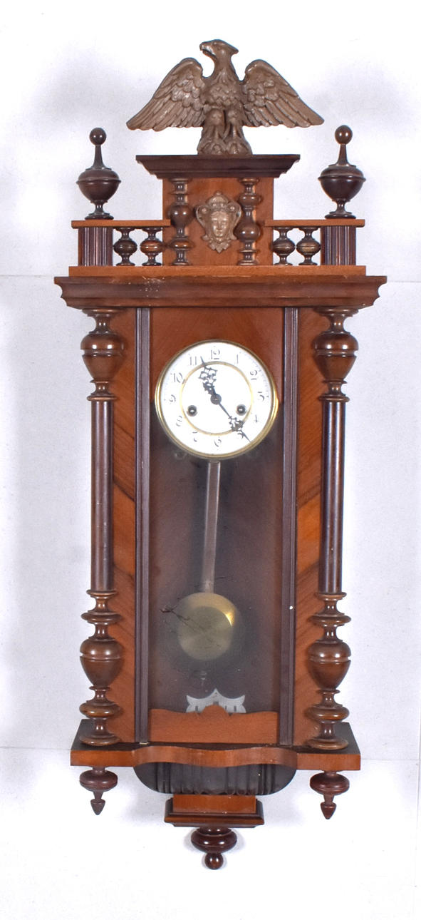 A wooden wall clock, Gustav Becker, 20th century.