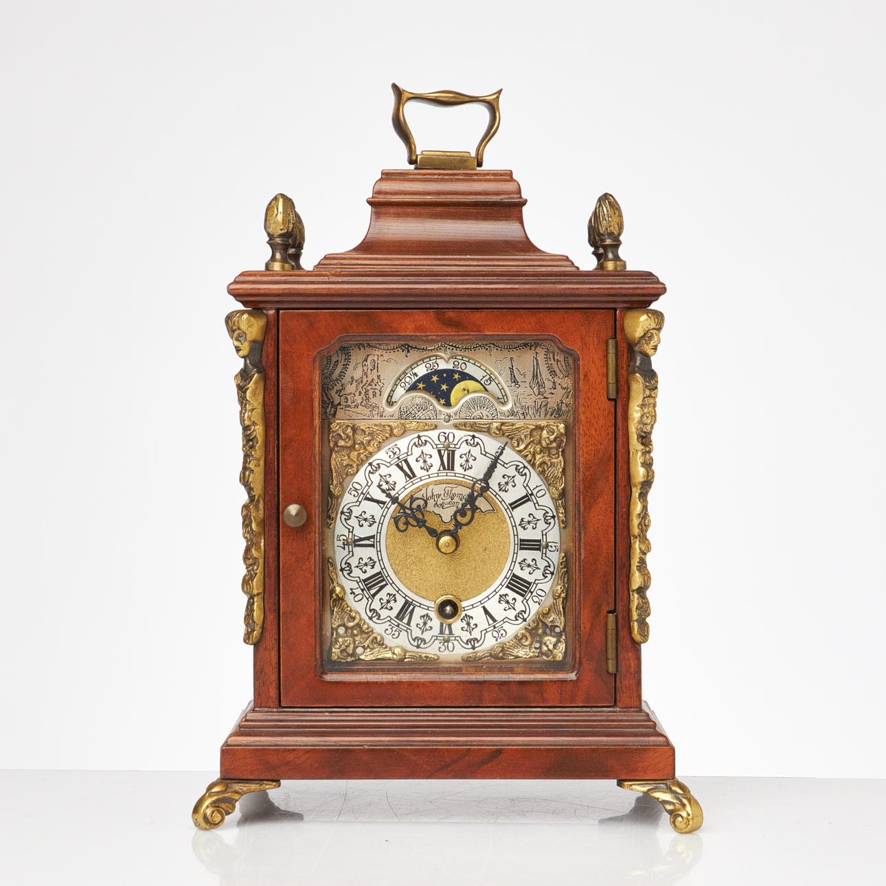 JOHN THOMAS, a moon phase table clock, WUBA, London, second half of the 20th century.