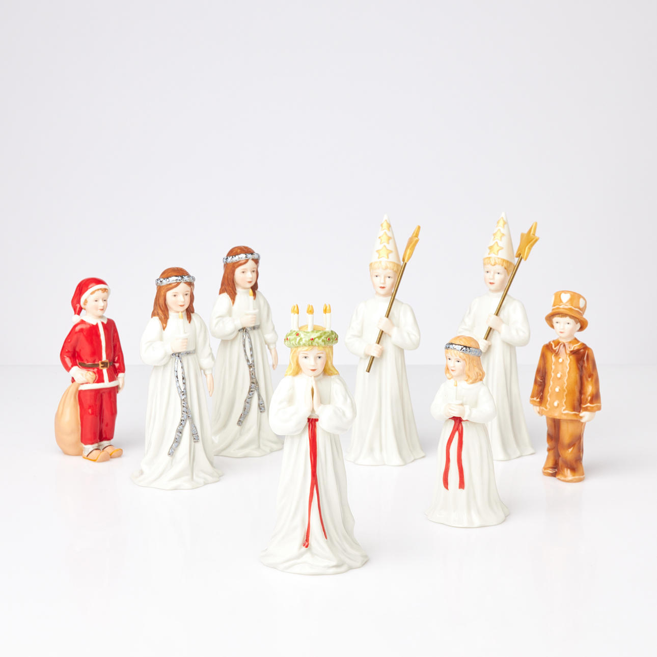 A four-leaf clover, 8 dlr, Lucia train, porcelain, figurines, marked below.