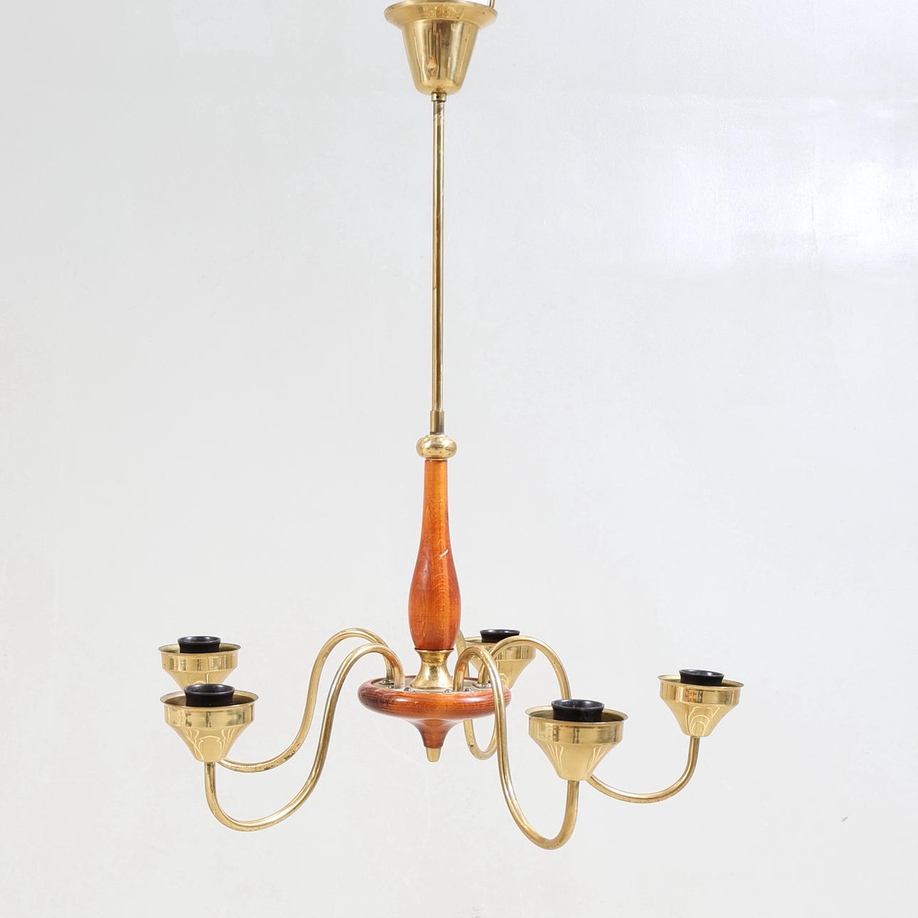 A ceiling lamp, brass & wood, 1940s/50s.