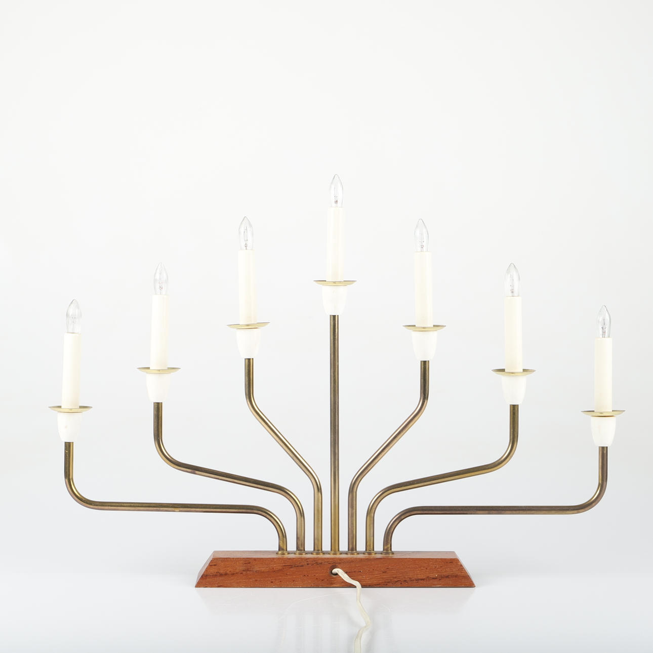 An Advent candlestick, “Christmas”, brass/teak, 1960s.