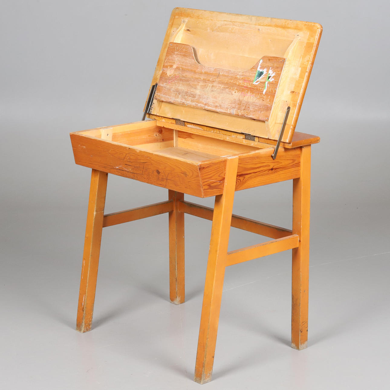 A school bench, mid 20th century.
