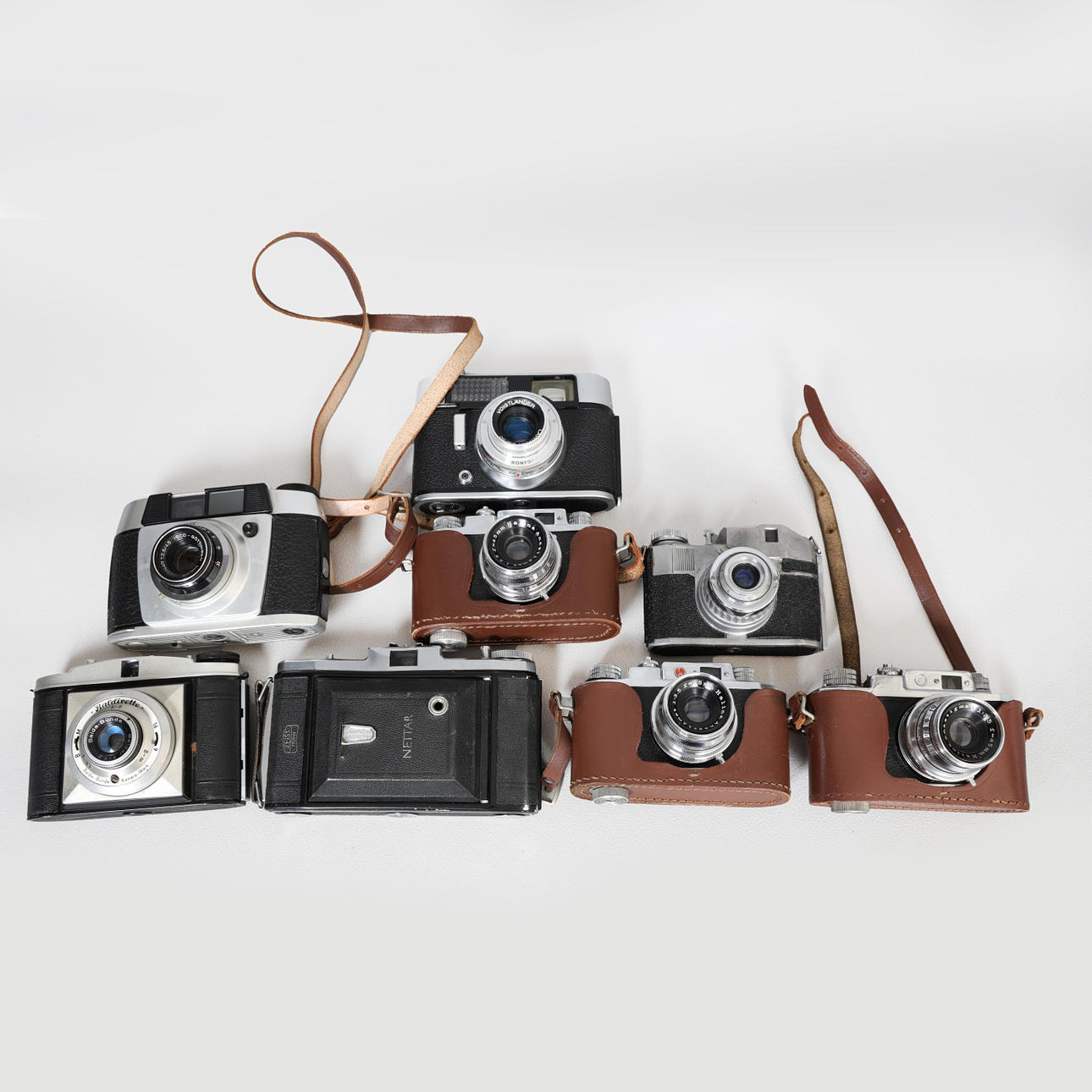 A COLLECTION OF CAMERAS (8).