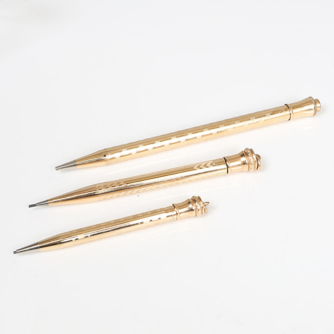 THREE EVERSHARP GOLD FILLED PENCILS (3).