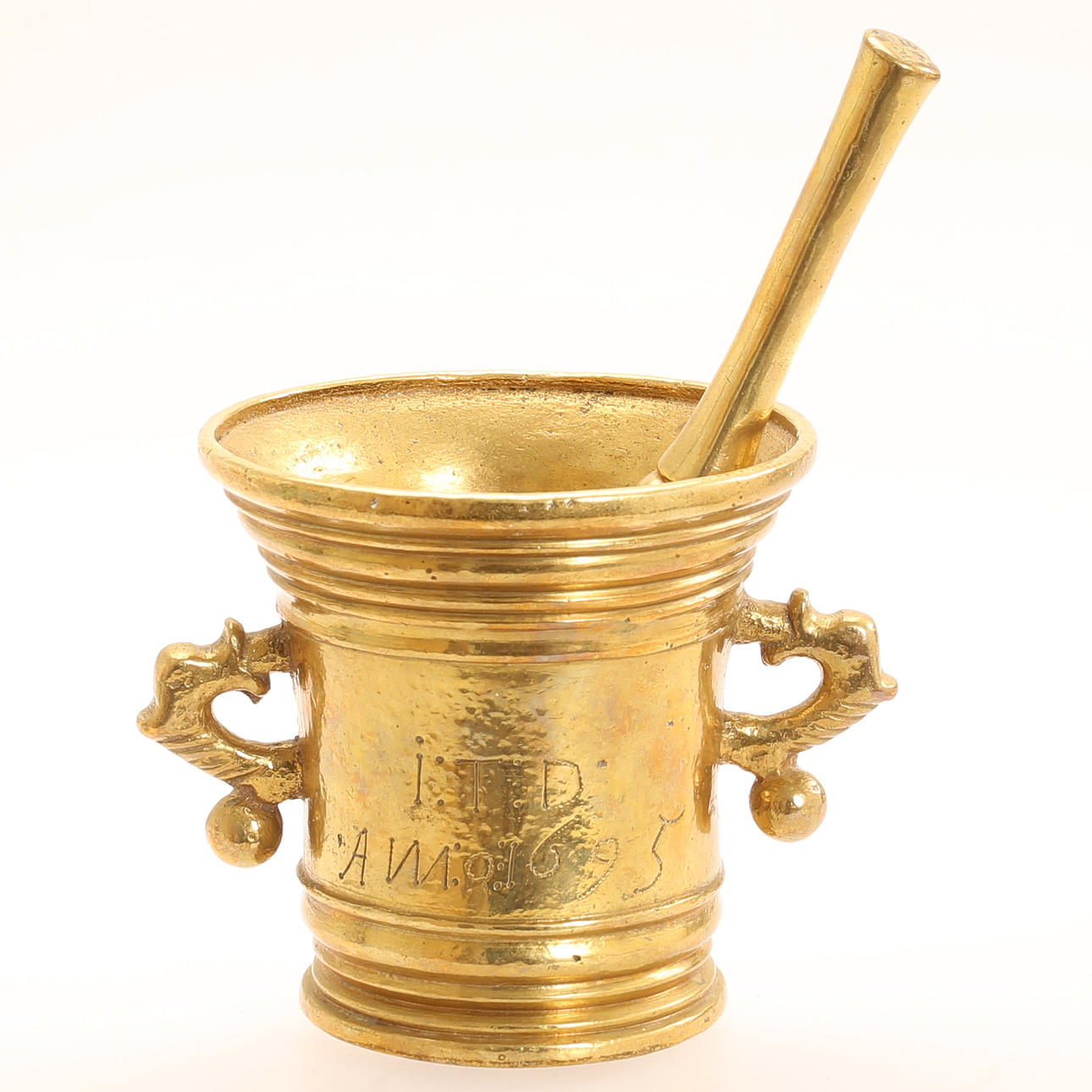 MORTEL with pestle, brass, marked 1695.