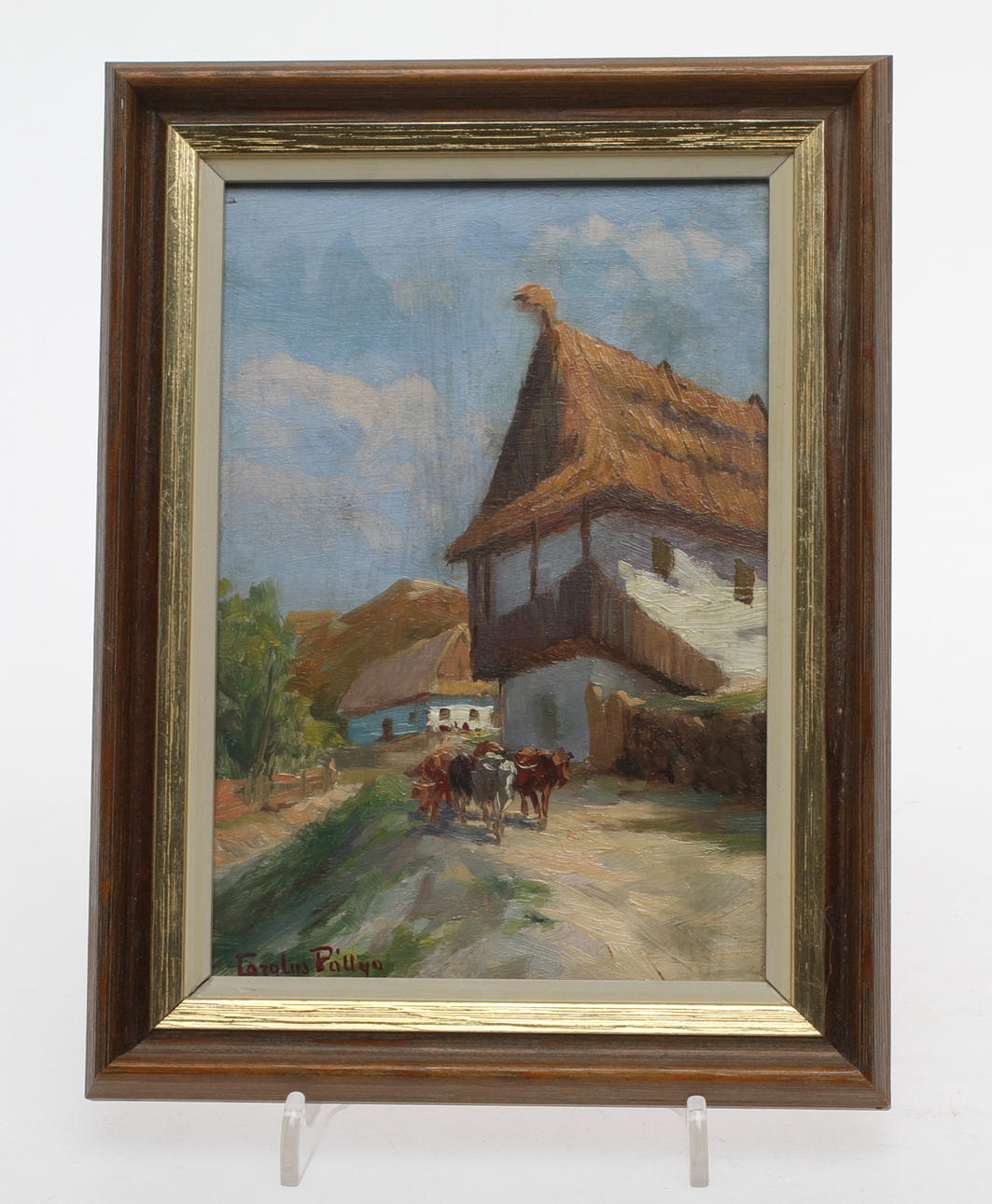 CAROLUS PALLYA. Bymotiv med kor, olja på pannå, signerad.