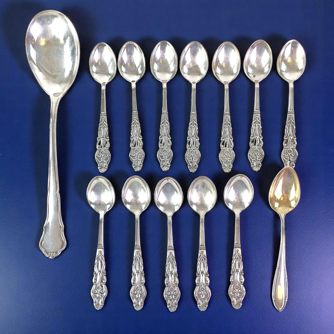 SPOONS, silver, 13 coffee spoons and a serving spoon.