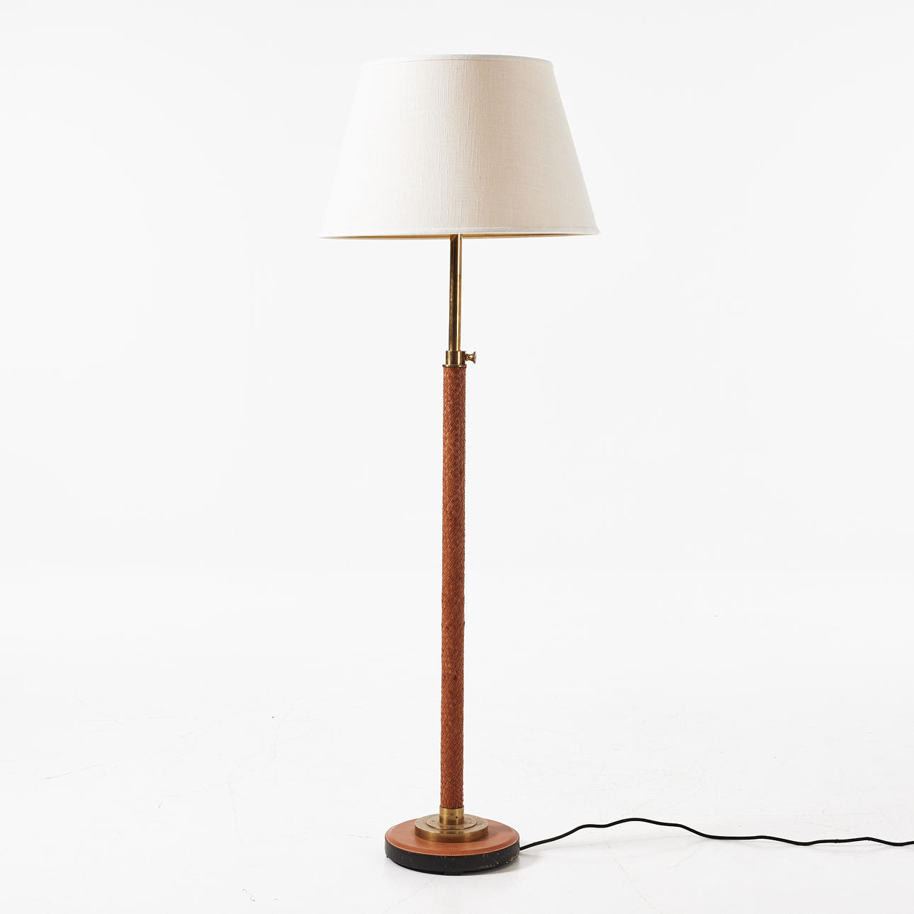 RALPH LAUREN. Floor lamp, circa 2000, leather-wrapped stem.