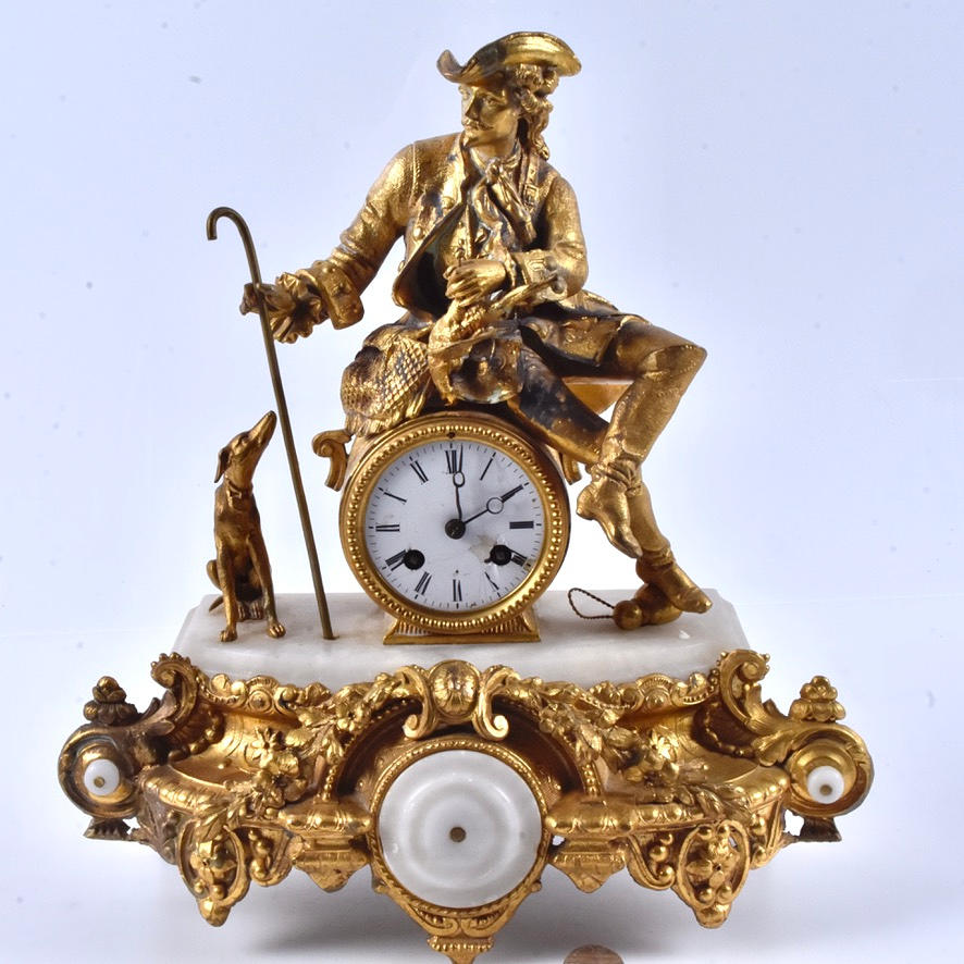 A 20th century yellow metal table clock.