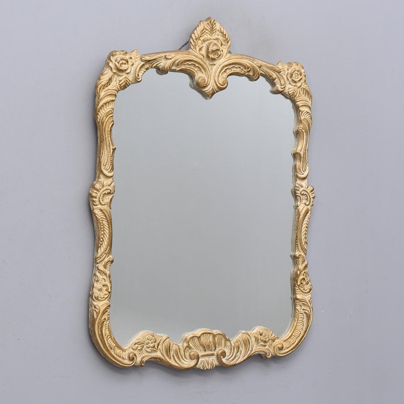 A rococo style mirror, second half of the 20th century.